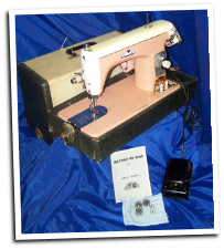 DRESSMAKER 303 SUPER DELUXE PINK/WHITE SEWING MACHINE
